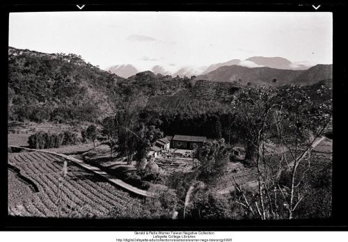 Fields and farmhouse in the valley