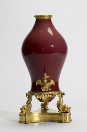 Red Vase Mounted as a Cistern