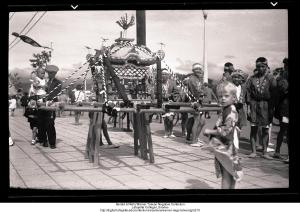 Arthur Warner in front of mikoshi